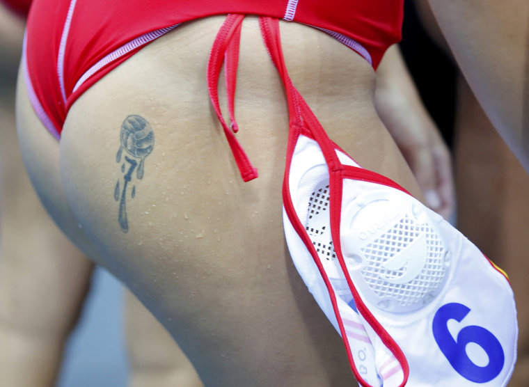 Image: Tattoo is seen on Spain's Martinez during their women's water polo quarterfinal round against Great Britain at Water Polo Arena during London 2012 Olympic Games